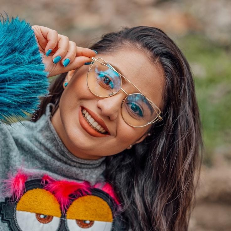 Kaveri Mehta, Lead Design Curator at Ventralo Matrix, reviewing corporate floral arrangements